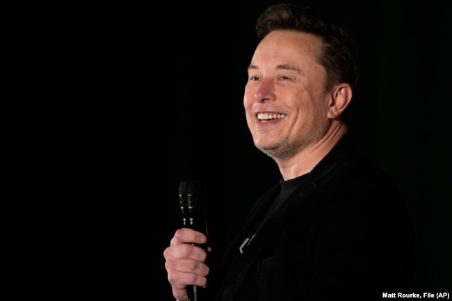 FILE - Elon Musk speaks as part of a campaign town hall in support of Republican presidential nominee former President Donald Trump in Folsom, Pa., Thursday, Oct. 17, 2024.