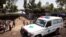 FILE - An ambulance waits next to a health clinic to transport a suspected Ebola patient, in Goma in the Democratic Republic of Congo, Aug. 5, 2019.