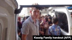 FILE - Abdul-Rahman Kassig is shown in a family photo somewhere along the Syrian border between late 2012 and autumn 2013 helping Special Emergency Response and Assistance (SERA) deliver supplies to refugees. (AFP PHOTO HANDOUT-Kassig Family HANDOUT)