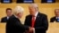 FILE - U.S. President Donald Trump shakes hands with Boris Johnson, left, then the British foreign secretary, as they take part in a session on reforming the United Nations at U.N. Headquarters in New York, Sept. 18, 2017.