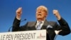 FILE - French far-right leader and presidential candidate Jean-Marie Le Pen gestures as he delivers a speech after the announcement of the preliminary official results of the election's first round, Apr. 22, 2007, in Paris.