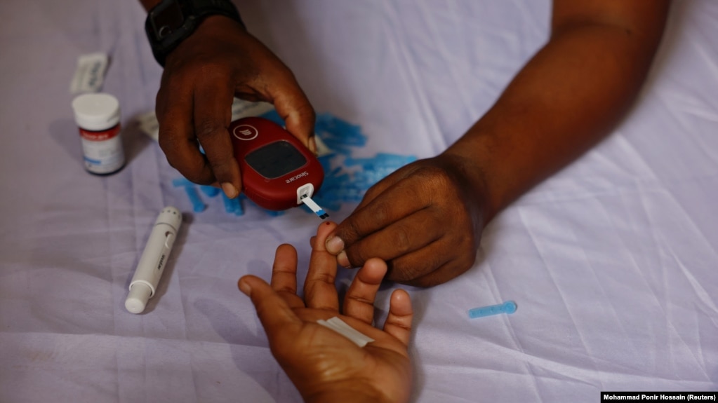 A person receives a blood sugar test for diabetes in Dhaka, Bangladesh on November 14, 2024. (REUTERS/Mohammad Ponir Hossain)