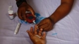 A person receives a blood sugar test for diabetes in Dhaka, Bangladesh on November 14, 2024. (REUTERS/Mohammad Ponir Hossain)