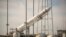 The Orbital Science Corporation Antares rocket is seen as it is raised into position at launch Pad-0A at NASA's Wallops Flight Facility, Wallops Island, Virginia, Dec. 17, 2013.