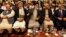 Afghan politicians, from second left to right, Mohammad Karim Khalili, Gulbuddin Hekmatyar, Haneef Atmar and Ustad Atta Mohammad Noor, and others attend the opening session of an Afghan Peace Conference in Bhurban, Pakistan, June 22, 2019.