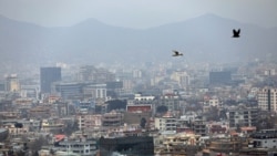 Birds flyover the city of Kabul, Afghanistan, Sunday, Jan. 31, 2021. In a report released Monday, Feb. 1, 2021, the Special Inspector General for Afghanistan Reconstruction, known as SIGAR, that monitors the billions of dollars the U.S. spends in…