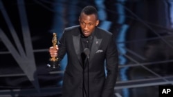 FILE - Mahershala Ali accepts the award for best actor in a supporting role for "Moonlight" at the Oscars in Los Angeles, Feb. 26, 2017.