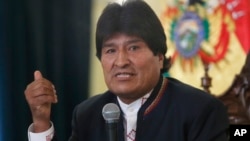 FILE - Bolivia's President Evo Morales speaks during a press conference at the government palace in La Paz, Bolivia, Feb. 24, 2016. By a slim margin, voters rejected his attempt to run a fourth consecutive term in 2019. Morales and his party are defying those results.