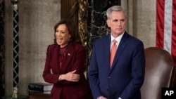 Vice President Kamala Harris stands with Speaker of the House Kevin McCarthy of Calif., after President Joe Biden delivered the State of the Union address to a joint session of Congress at the U.S. Capitol, Feb. 7, 2023, in Washington.