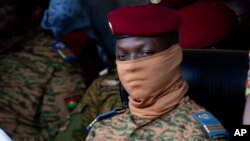 (FILE) Coup leader Capt. Ibrahim Traore participates in a ceremony in Burkina Faso.