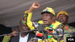 FILE - Zimbabwe President Emmerson Mnangagwa addresses ruling ZANU-PF party supporters in Zvimba, Robert Mugabe’s rural home, southwest of Harare, Nov. 24, 2018. (C. Mavhunga for VOA)