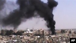 This image made from amateur video provided by the Shaam News Network and accessed Monday, June 18, 2012