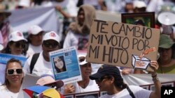 FILE— People attend the annual National March of Searching Mothers, held every Mother's Day in Mexico City, May 10, 2024.