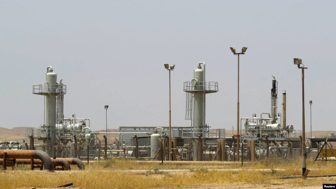 FILE - A view shows the Bai Hassan oilfield northwest of Kirkuk, July 12, 2014.