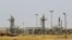 FILE - A view shows the Bai Hassan oilfield northwest of Kirkuk, July 12, 2014.