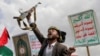 Protesters, largely Houthi supporters, rally to show solidarity with Palestinians in the Gaza Strip, in Sanaa, Yemen, May 24, 2024. Houthi leaders postponed the announced release of 100 Yemeni military prisoners on May 25.