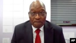 In this frame grab former South Africa President Jacob Zuma, appears on a screen virtually from the correctional service facility Estcourt, in Pietermaritzburg, South Africa, July 19, 2021.