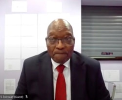 In this Frame grab former South Africa President Jacob Zuma, appears on a screen virtually from the correctional service facility Estcourt, in Pietermaritzburg, South Africa, July 19, 2021.