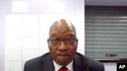 FILE - In this Frame grab former South Africa President Jacob Zuma, appears on a screen virtually from the correctional service facility Estcourt, in Pietermaritzburg, South Africa, July 19, 2021.