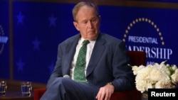 FILE - Former U.S. President George W. Bush listens to a question during a Presidential Leadership Scholars graduation event at the George W. Bush Presidential Center in Dallas, Texas, June 27, 2019.