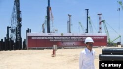 Presiden Joko Widodo saat meresmikan groundbreaking pembangunan smelter PT Freeport Indonesia di Gresik, Jawa Timur. (Biro Setpres)