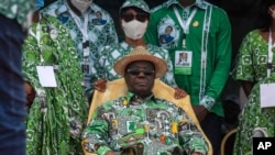 FILE— Former Ivory Coast President Henri Konan Bédié attends a party rally in Yamoussoukro, Ivory Coast, on Sept. 12, 2020. 