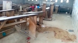 An empty classroom is seen following a shooting at a school in Kumba, Cameroon, Oct. 24, 2020, in this screen grab obtained from a social media video.