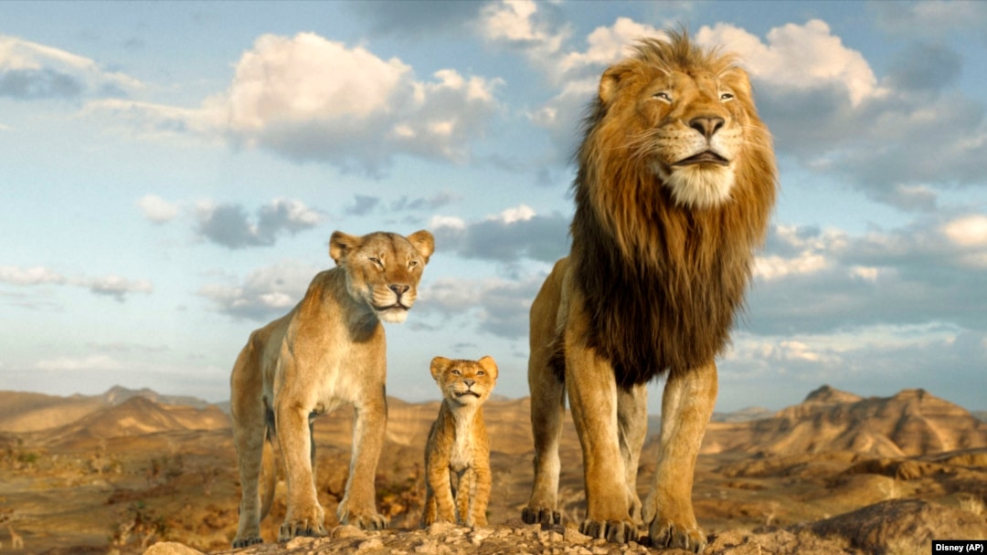 This image released by Disney shows characters Afia, voiced by Anika Noni Rose, left, Mufasa, voiced by Braelyn Rankins, center, and Masego, voiced by Keith David, in a scene from "Mufasa: The Lion King." 