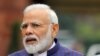 FILE PHOTO: India's Prime Minister Narendra Modi speaks to the media inside the parliament premises on the first day of the winter session in New Delhi, India, November 18, 2019. REUTERS/Altaf Hussain/File Photo