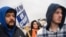 Union members in Spring Hill, Tennessee picket General Motors on Oct. 30, 2023. The company and the union reached a tentative deal Monday, ending the six-week campaign of coordinated strikes. 