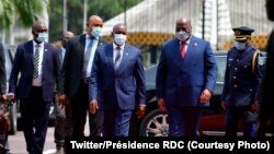 Le président de la RDC, Felix Tshisekedi, accueille son homologue du Botswana Dr. Mokgwetsi Eric Keabetswe Masisi au palais de Kinshasa, 15 mars 2021.