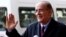 FILE - Yahya Aridi, spokesman of the Syrian Negotiation Commission (SNC) arrives for a session of Syrian peace talks in Geneva, Switzerland, Dec. 1, 2017.
