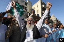 Pakistanis rally to express solidarity with Indian Kashmiris struggling for their independence, in Karachi, Pakistan, March 4, 2020.