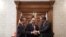 Afghanistan's Minister of Foreign Affairs Salahuddin Rabbani, center, Pakistan's Foreign Minister Shah Mehmood Qureshi, first right, and Chinese Foreign Minister Wang Yi, first left, shake hands after signing the agreement at the presidential palace in Kabul, Dec. 15, 2018.