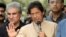 Pakistani opposition leader Imran Khan talks to media outside his house in Islamabad, Pakistan, Nov. 1, 2016. Instead of a protest, Khan plans a celebration after the Supreme Court's decision to look into the "Panama Papers." 