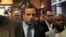Oscar Pistorius leaves after court proceedings at the Pretoria Magistrates court, June 4, 2013.