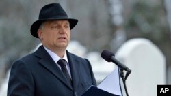 FILE - Hungarian Prime Minister Viktor Orban speaks during a ceremony in the Kozma Street Jewish Cemetery in Budapest, Hungary.