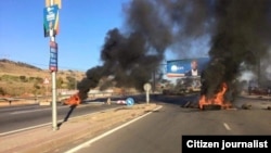 Buses and Haulage Truck burning in South African Political Violence