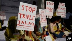 Activists of various social organizations protest against "Triple Talaq," a divorce practice prevalent among Muslims in New Delhi, India, May 10, 2017.