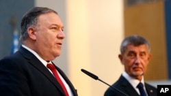 U.S. Secretary of State Mike Pompeo, left, and the Prime Minister of Czech Republic Andrej Babis address the media during a press conference as part of a meeting in Prague, Czech Republic, Aug. 12, 2020.