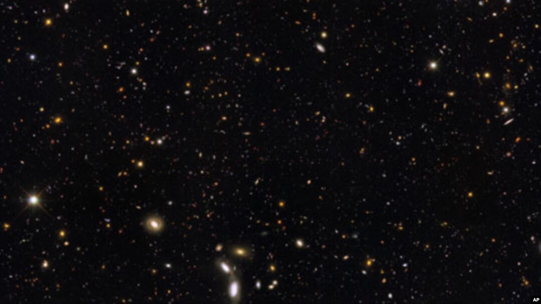 More than 12 billion years of cosmic history are shown in this unprecedented, panoramic, full-color view of thousands of galaxies in various stages of assembly