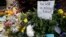 A makeshift memorial for actor Robin Wlliiams is shown outside a home which was used in the filming of the movie "Mrs. Doubtfire", Aug. 15, 2014, in San Francisco. Authorities said Williams committed suicide. 