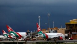 FILE - Kenya Airways planes are seen parked during a pilots strike organized by Kenya Airline Pilots Association (KALPA) at the Jomo Kenyatta International airport near Nairobi, Apr. 28, 2016.