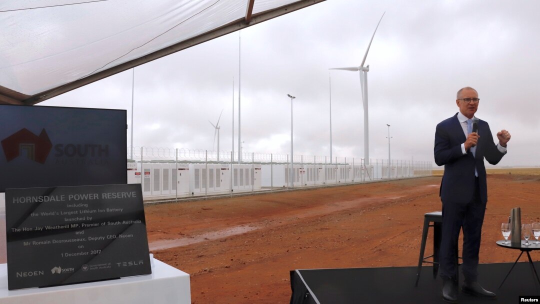 South Australian Premier Jay Weatherill speaks as he stands next to a plaque during the official launch of the Hornsdale Power Reserve, featuring the world's largest lithium ion battery made by Tesla, near the South Australian town of Jamestown, Dec. 1, 2017.