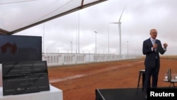 South Australian Premier Jay Weatherill speaks as he stands next to a plaque during the official launch of the Hornsdale Power Reserve, featuring the world's largest lithium ion battery made by Tesla, near the South Australian town of Jamestown, Dec. 1, 2017.