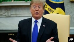 President Donald Trump speaks in the Oval Office of the White House, Feb. 13, 2019.