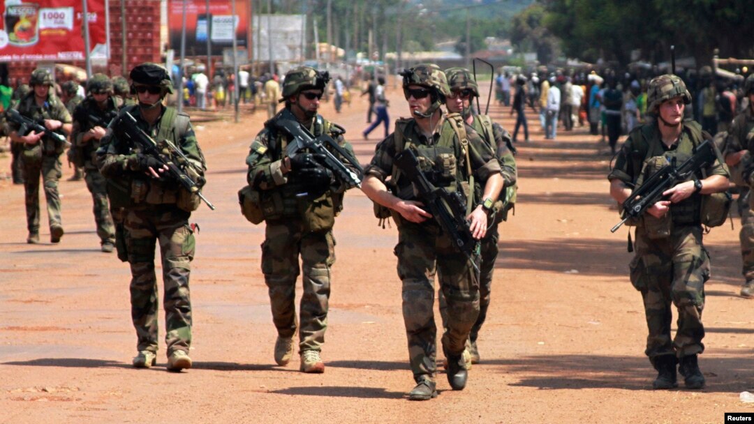 French soldiers are seen patrolling a street in Bangui December 8, 2013.
