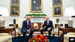 President Joe Biden meets with President-elect Donald Trump in the Oval Office of the White House, in Washington, Nov. 13, 2024.