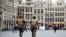 Belgian soldiers patrol in the Grand Place of Brussels following Tuesday's bombings in Brussels, Belgium, March 24, 2016. 