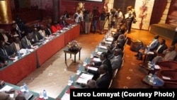 South Sudan peace negotiators meet in a night club in Addis Ababa, Ethiopia, Jan. 13, 2014. 